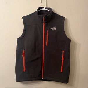 The North Face Men's Black Apex bionic Vest with Red orange Accents